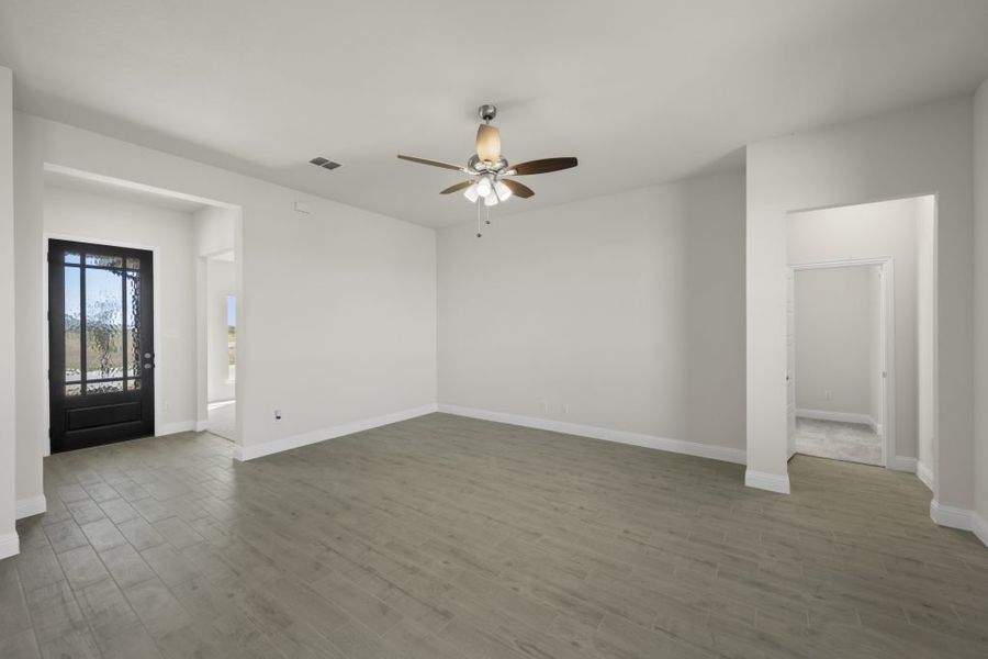 Front exterior of a new home in Still Water Lake, Godley, TX, highlighting curb appeal (Image 15). Front exterior of a new home in Still Water Lake, Godley, TX, highlighting curb appeal (Image 15).