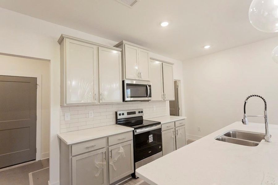 Furnished interior view inside a new home in , Buford (Image 8).