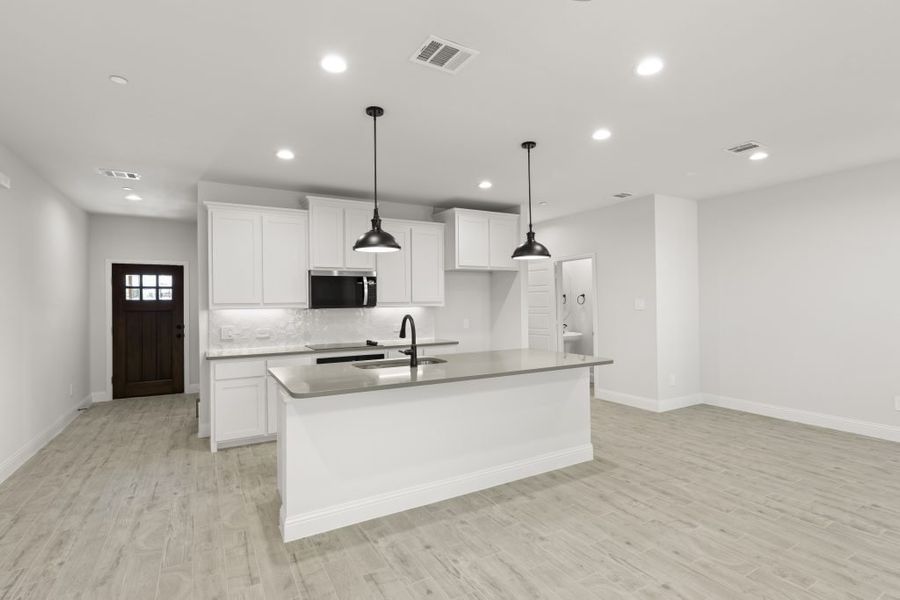 Front exterior of a new home in Sereno Oaks at Buckner Terrace, Dallas, TX, highlighting curb appeal (Image 7). Front exterior of a new home in Sereno Oaks at Buckner Terrace, Dallas, TX, highlighting curb appeal (Image 7).