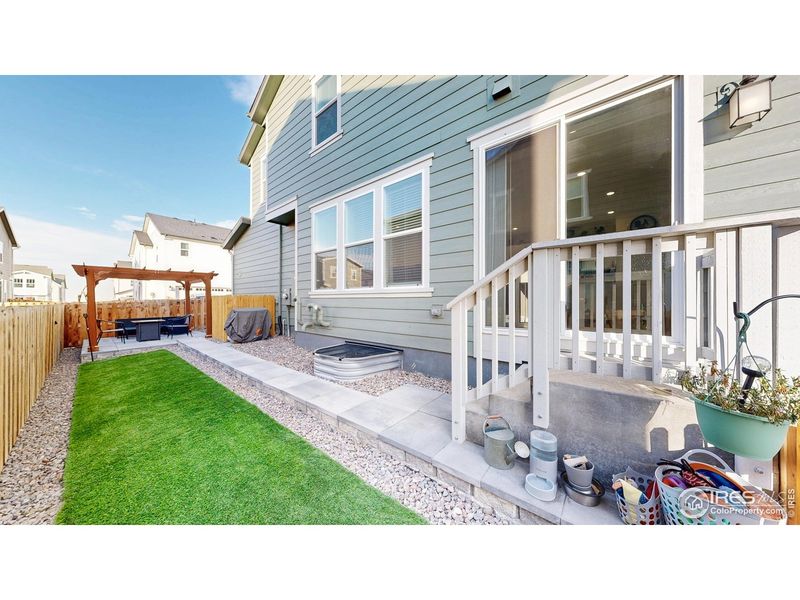 Exterior details and patio area of a home in , Commerce City (Image 28).