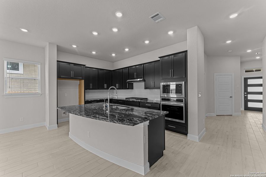 Furnished interior view inside a new home in Ladera - High Point 45', San Antonio (Image 3).