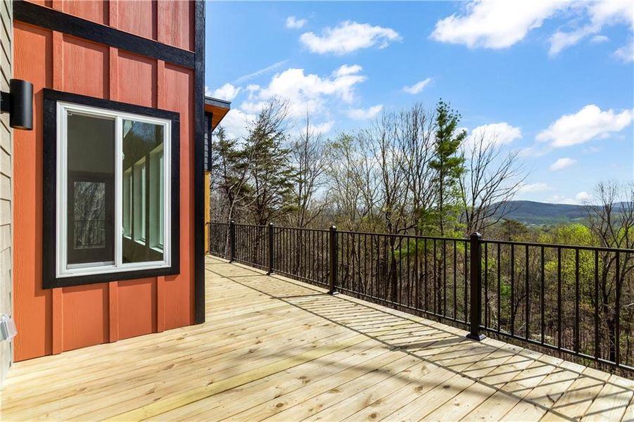 Exterior details and patio area of a home in , Ellijay (Image 26).