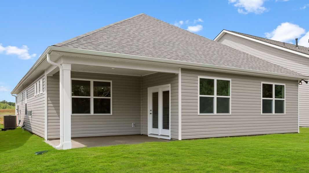 Exterior details and patio area of a home in Whitehawk Meadows, Travelers Rest (Image 4).