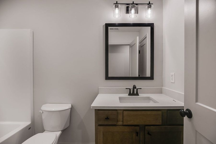 Furnished interior view inside a new home in Parmer Farms, Roopville (Image 15).