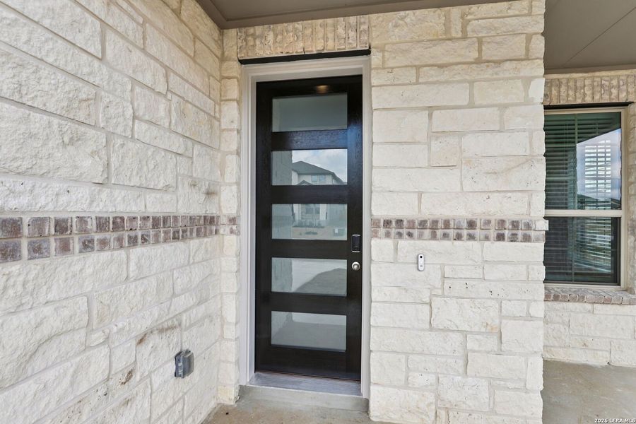 Exterior details and patio area of a home in Lark Canyon, New Braunfels (Image 29).