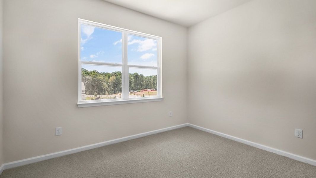 Spacious, unfurnished interior of a new home in The Townes at Madden West, Fuquay Varina (Image 22).