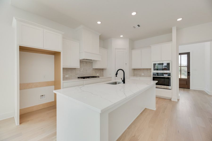 Furnished interior view inside a new home in Cottages of Celina, Celina (Image 6).