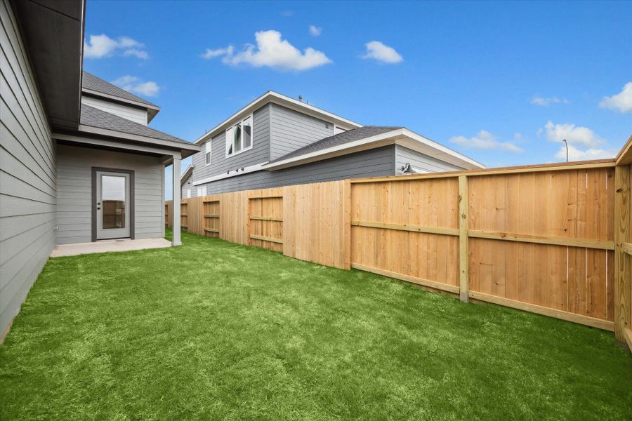 Exterior details and patio area of a home in Elyson, Katy (Image 3).