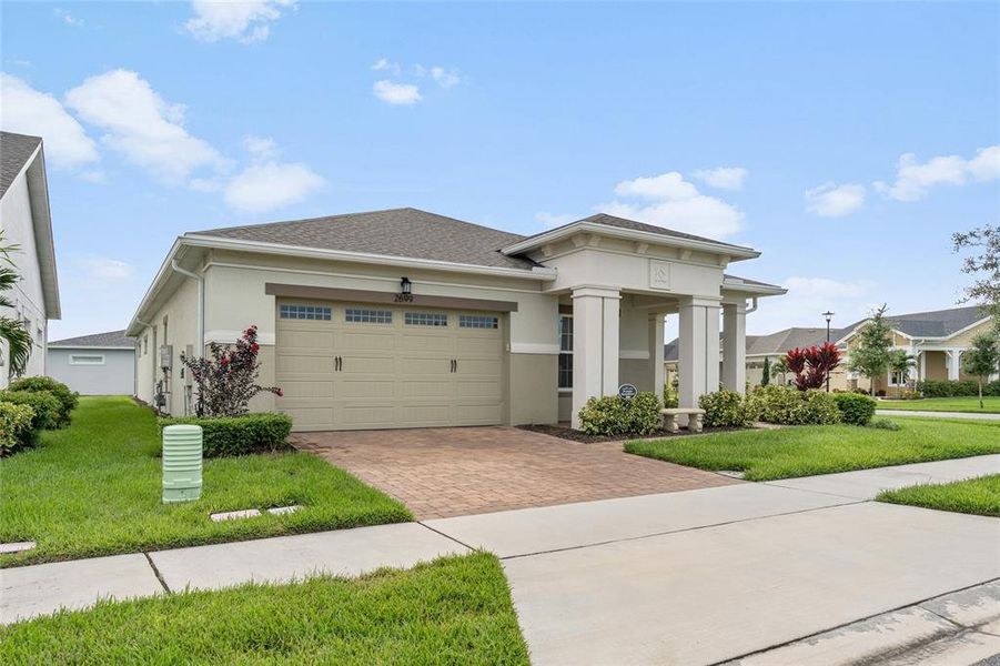 Front exterior of a new home in , St. Cloud, FL, highlighting curb appeal (Image 25).
