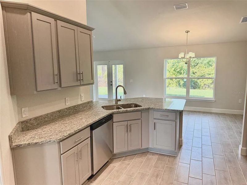 Furnished interior view inside a new home in South Gulf Cove, Port Charlotte (Image 6).