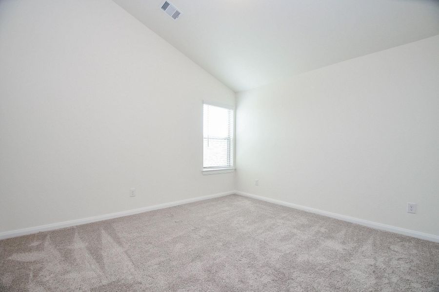 This expansive bedroom is the perfect space dual purposes!