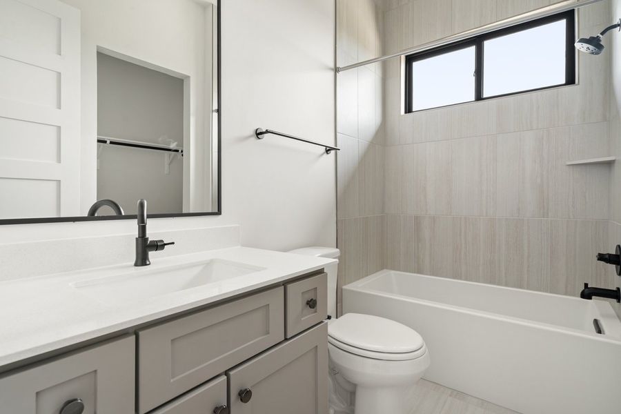 Furnished interior view inside a new home in Milky Way at River Place, Austin (Image 27).