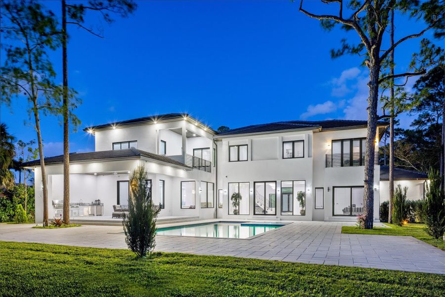 Front exterior of a new home in , Parkland, FL, highlighting curb appeal (Image 24).