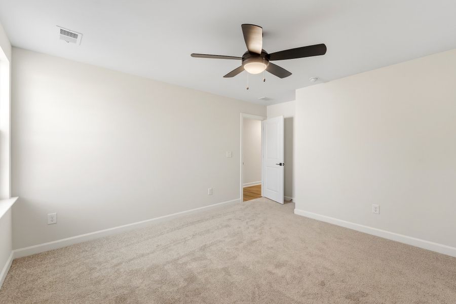 Spacious, unfurnished interior of a new home in Bens Crossing, Woodruff (Image 47).