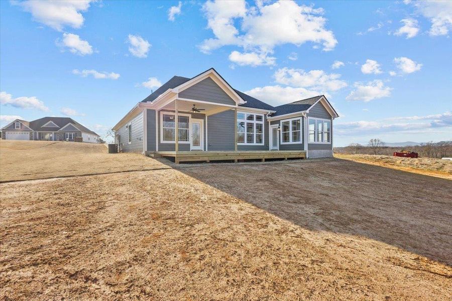 Front exterior of a new home in Messer Farms, Inman, SC, highlighting curb appeal (Image 2).