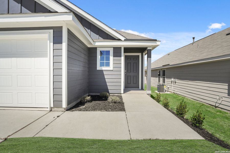 Exterior details and patio area of a home in Hickory Ridge, Elmendorf (Image 18).