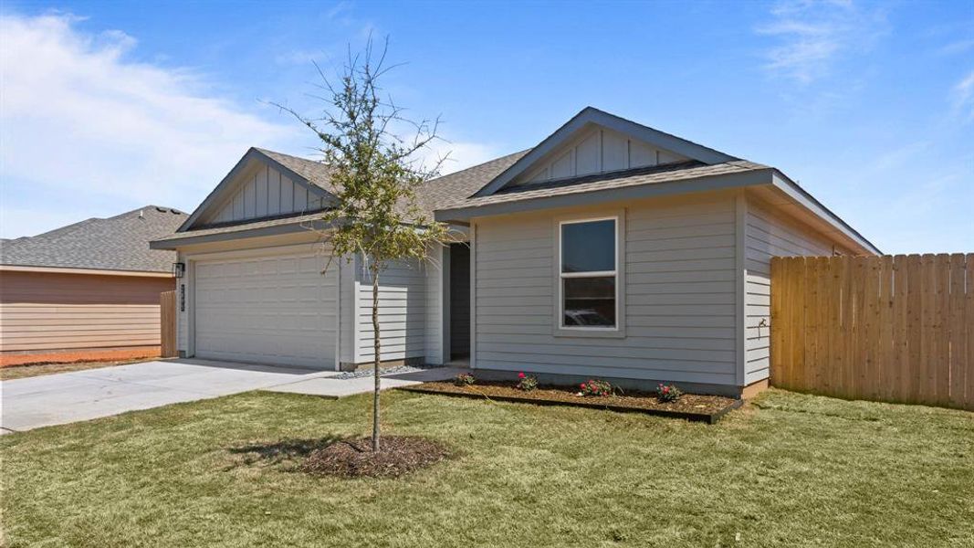 Ranch-style house featuring board and batten siding, an attached garage, driveway, and roof with shingles Ranch-style house featuring board and batten siding, an attached garage, driveway, and roof with shingles