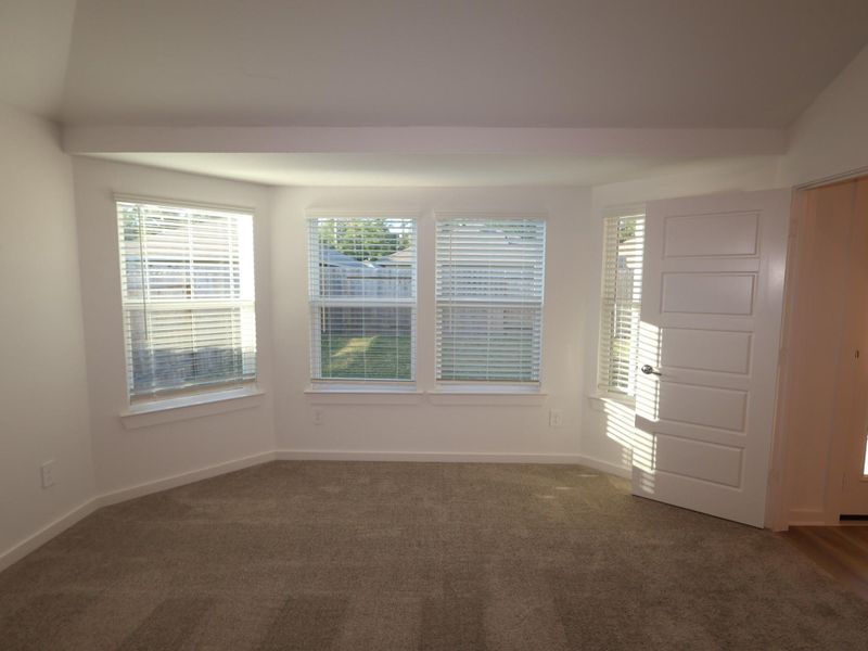 Spacious, unfurnished interior of a new home in Pinewood at Grand Texas, New Caney (Image 28).