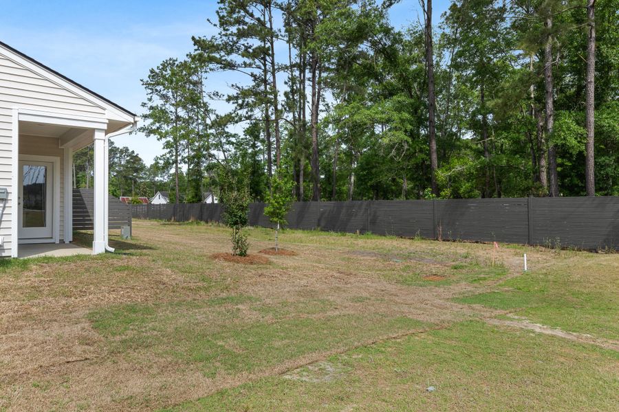 Exterior details and patio area of a home in Hammock Walk at Nexton, Summerville (Image 2). Exterior details and patio area of a home in Hammock Walk at Nexton, Summerville (Image 2).