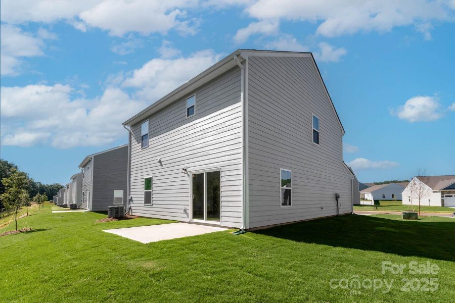 Exterior details and patio area of a home in Village at Granite, Salisbury (Image 3). Exterior details and patio area of a home in Village at Granite, Salisbury (Image 3).
