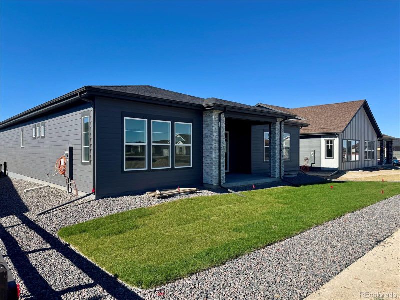Exterior details and patio area of a home in Hilltop at Inspiration, Aurora (Image 3).