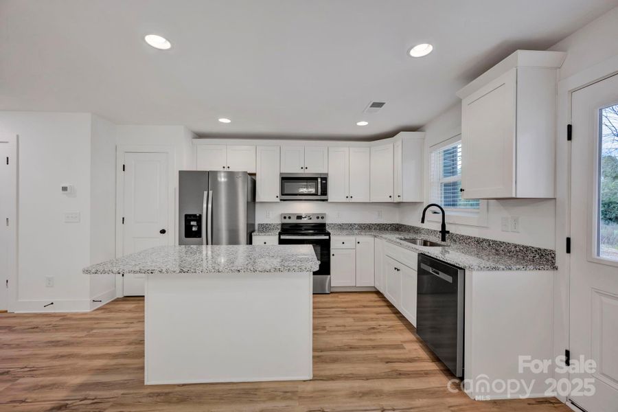 Furnished interior view inside a new home in , Concord (Image 5).
