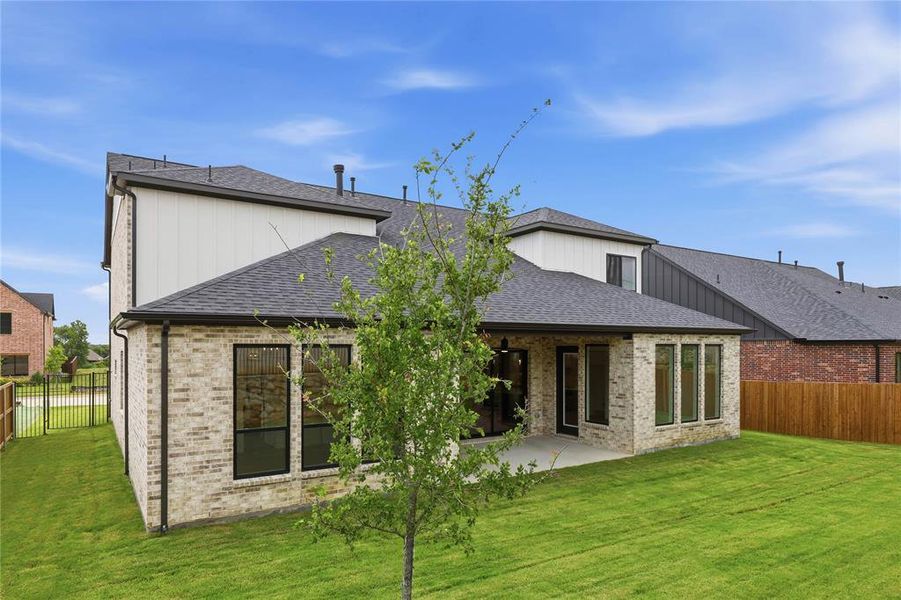 Exterior details and patio area of a home in The Grove, North Richland Hills (Image 27).