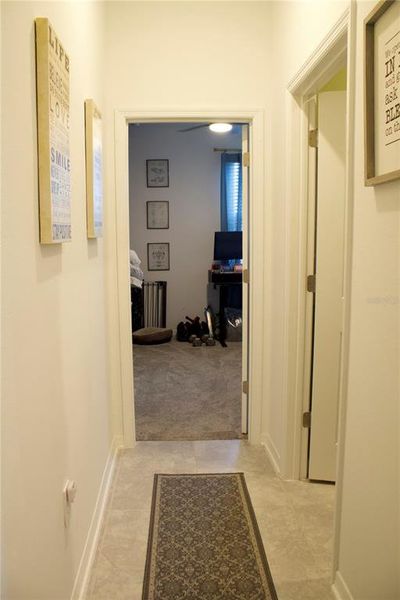 Hall entry to Bedroom 4 and Indoor Laundry