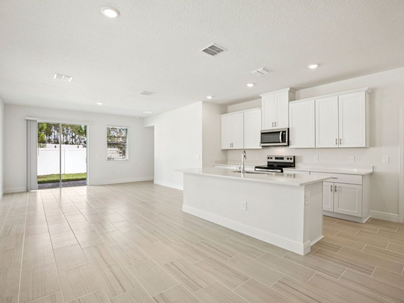 Furnished interior view inside a new home in Cyrene at Minneola - Villas, Minneola (Image 5).