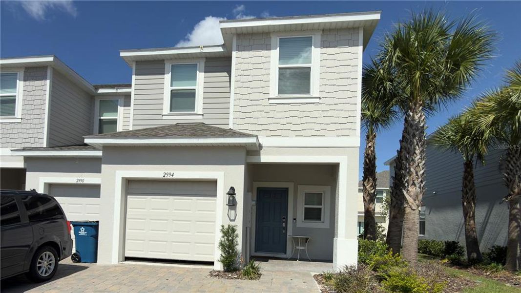 Front exterior of a new home in , Davenport, FL, highlighting curb appeal (Image 1). Front exterior of a new home in , Davenport, FL, highlighting curb appeal (Image 1).