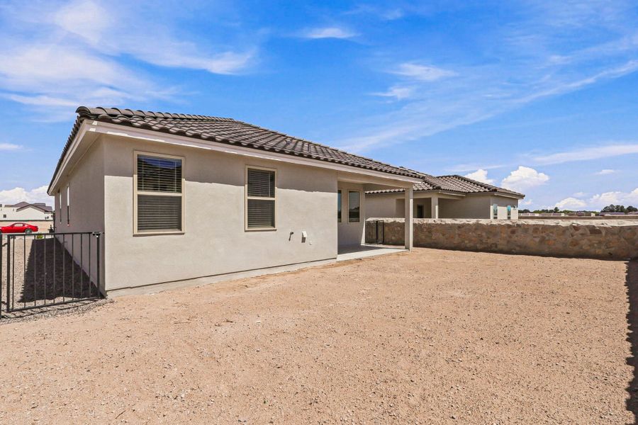 Exterior details and patio area of a home in Paseos Del Este, El Paso (Image 31).