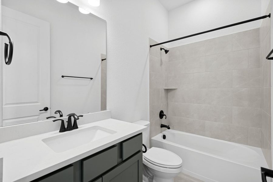 Furnished interior view inside a new home in Riceland - Enclave Row Collection, Mont Belvieu (Image 6).