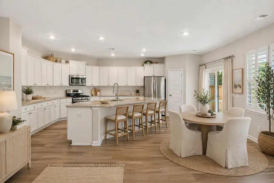 Furnished interior view inside a new home in Lindera Preserve at Cane Bay Plantation, Summerville (Image 7).