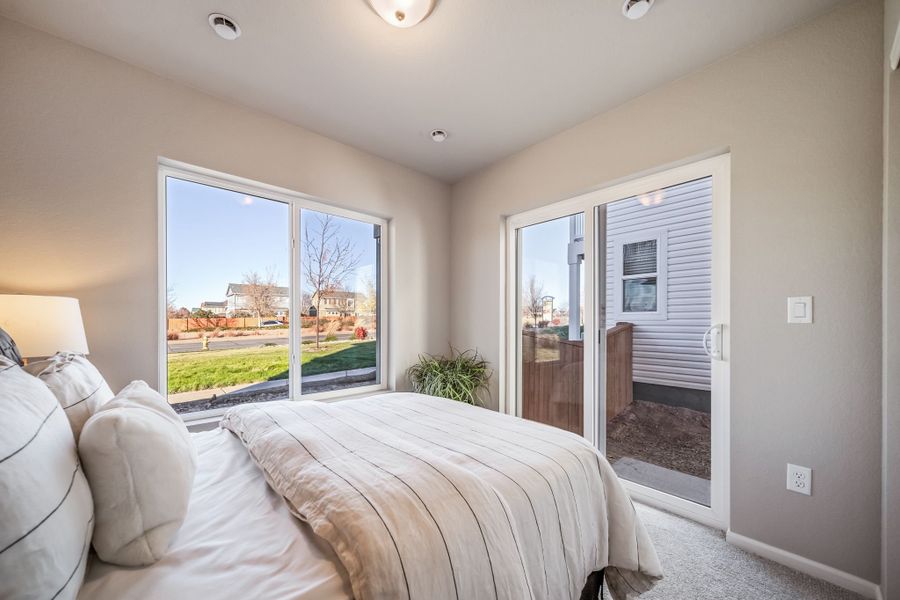 Furnished interior view inside a new home in Reunion, Commerce City (Image 17).
