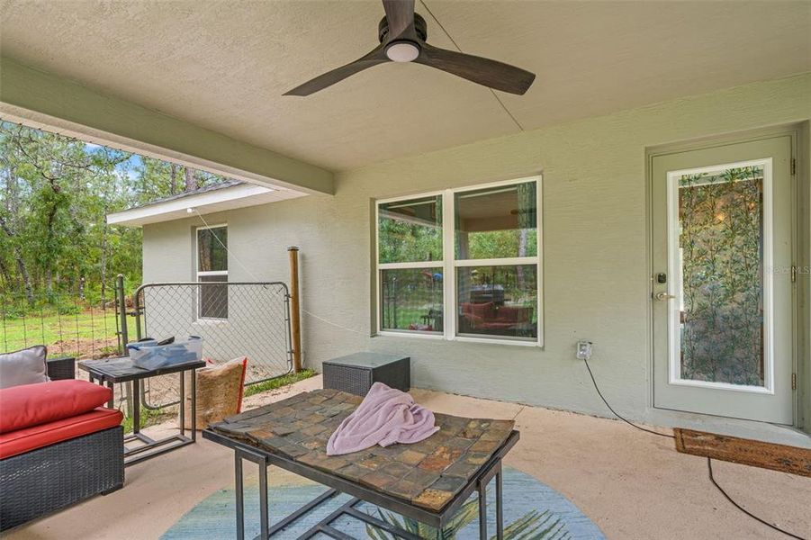 Exterior details and patio area of a home in Royal Highlands, Brooksville (Image 27).
