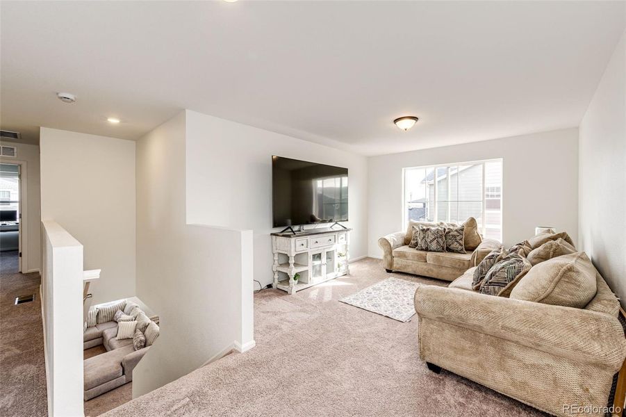 Furnished interior view inside a new home in Painted Prairie, Aurora (Image 11).
