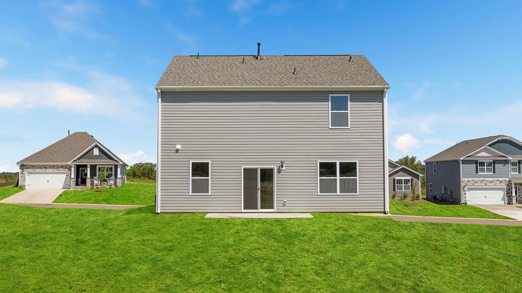 Front exterior of a new home in Woodglen, Piedmont, SC, highlighting curb appeal (Image 2).