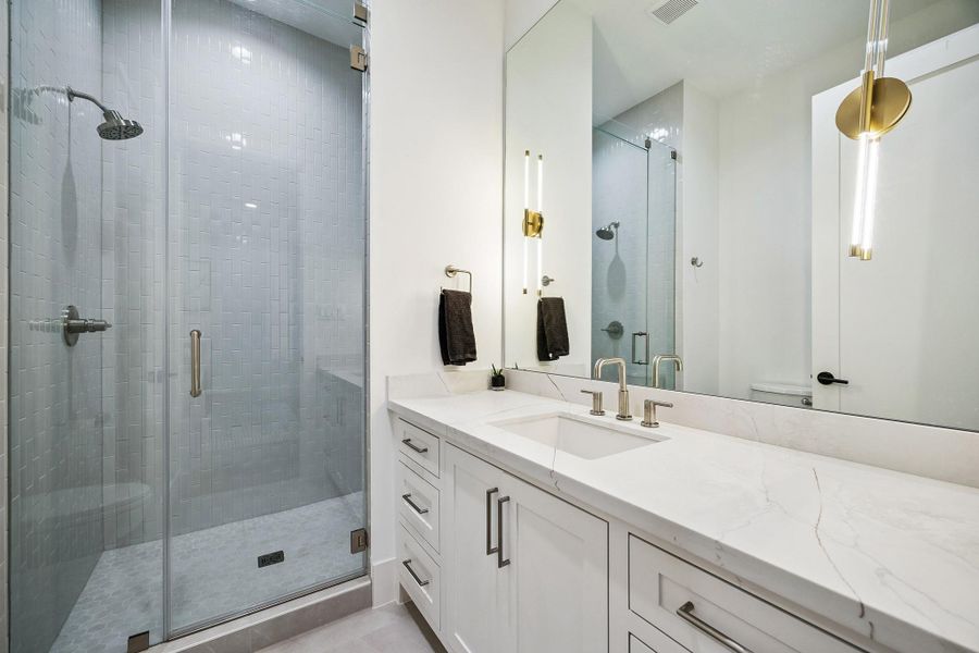 Ensuite bathroom to a secondary bedroom.