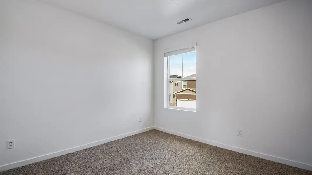 Spacious, unfurnished interior of a new home in Sky Ranch, Watkins (Image 15).
