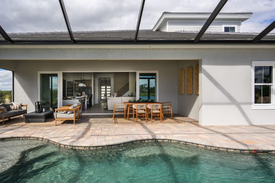 Representative furnished interior of a home built from the Bayport II by Homes by WestBay in Longleaf at Grand Park, Sarasota (Image 25).