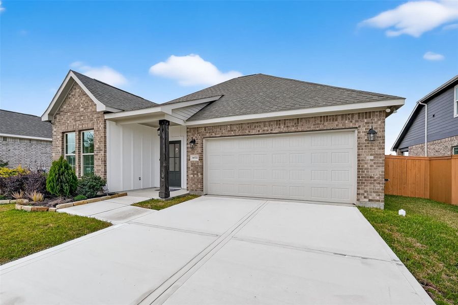 Front exterior of a new home in Emberly, Beasley, TX, highlighting curb appeal (Image 2). Front exterior of a new home in Emberly, Beasley, TX, highlighting curb appeal (Image 2).