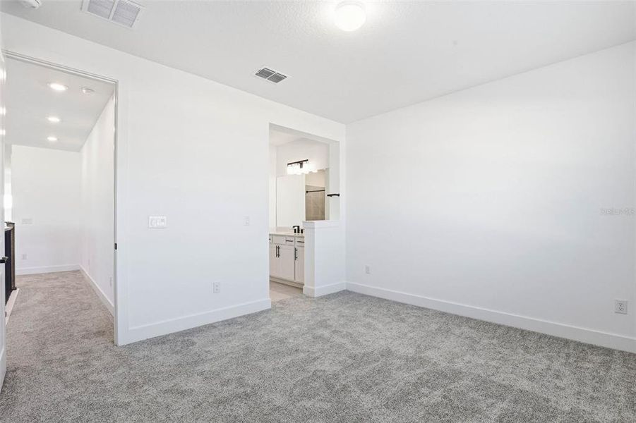 Spacious, unfurnished interior of a new home in Vida's Way, Wesley Chapel (Image 61).