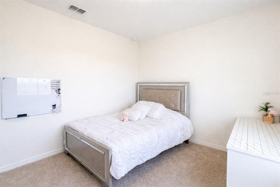 Furnished interior view inside a new home in Waterleigh, Winter Garden (Image 5).
