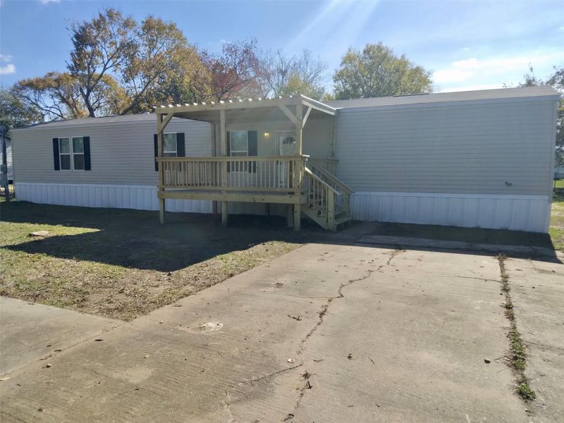 Exterior details and patio area of a home in , Oyster Creek (Image 12).