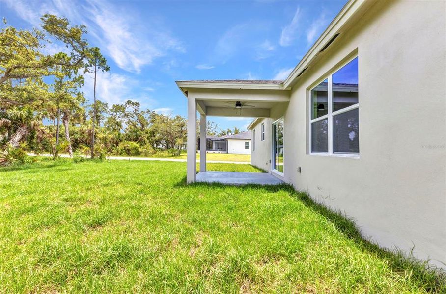 Front exterior of a new home in , Port Charlotte, FL, highlighting curb appeal (Image 23).