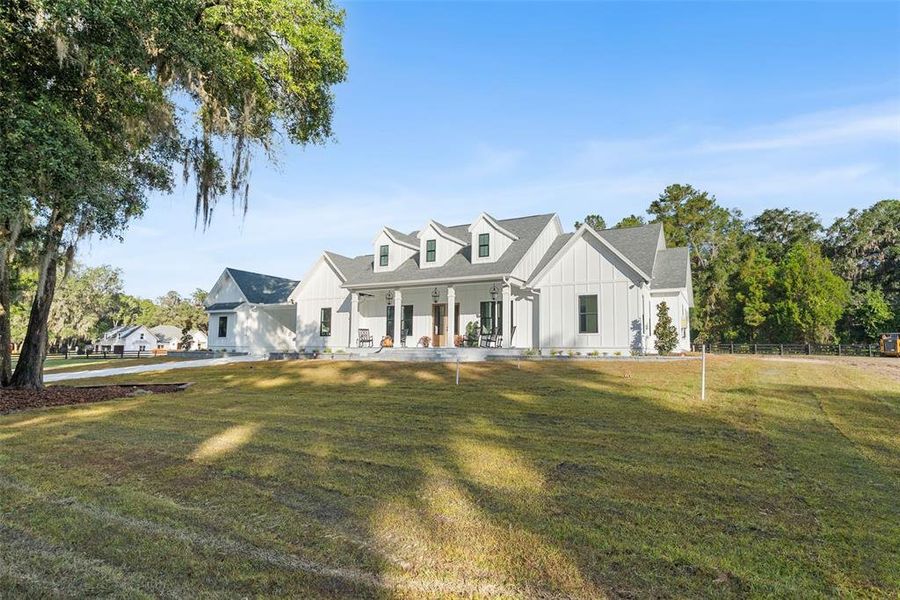 Front exterior of a new home in , Newberry, FL, highlighting curb appeal (Image 26). Front exterior of a new home in , Newberry, FL, highlighting curb appeal (Image 26).