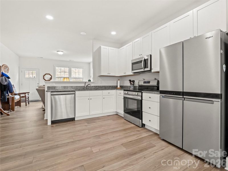 Furnished interior view inside a new home in , Black Mountain (Image 16).