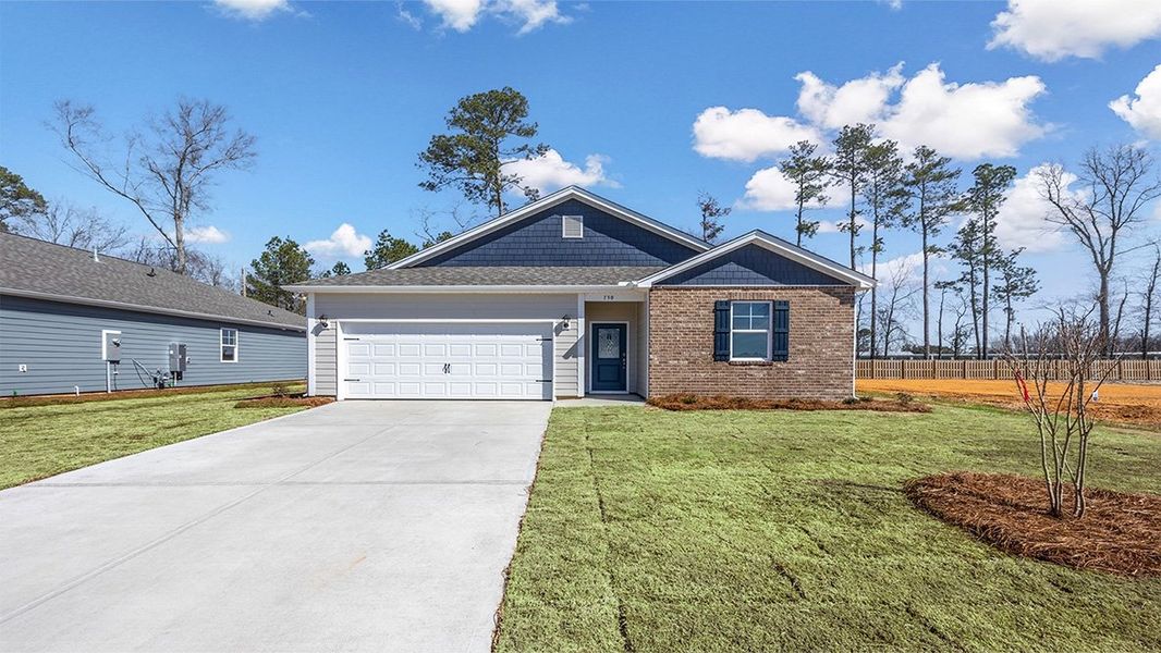 Front exterior of a new home in Sease's Pond, Gilbert, SC, highlighting curb appeal (Image 2). Front exterior of a new home in Sease's Pond, Gilbert, SC, highlighting curb appeal (Image 2).