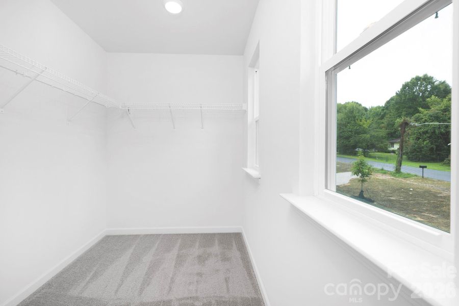 Spacious, unfurnished interior of a new home in , Huntersville (Image 27).