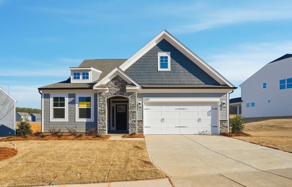 Front exterior of a new home in Carrington, Stanley, NC, highlighting curb appeal (Image 2). Front exterior of a new home in Carrington, Stanley, NC, highlighting curb appeal (Image 2).